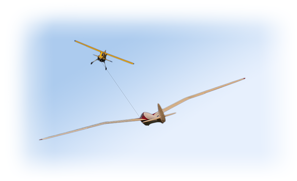 Modellflugzeug beim Schlepp